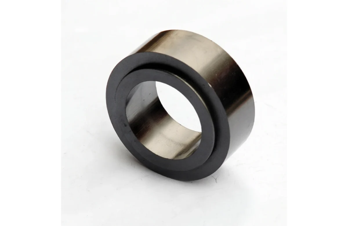Precision graphite bearing with integrated grooves for enhanced performance