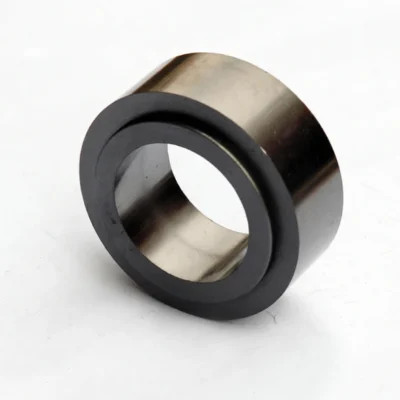Precision graphite bearing with integrated grooves for enhanced performance